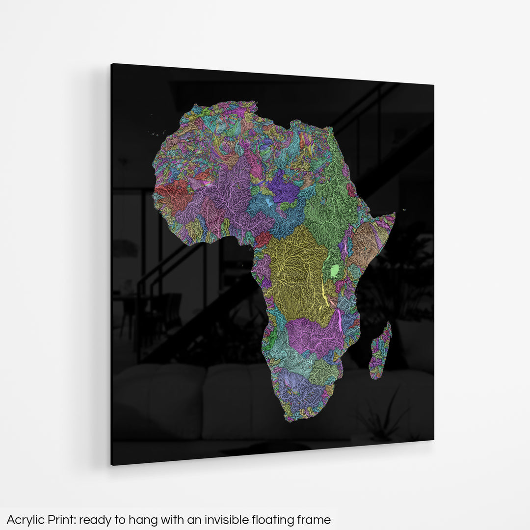 A colourful Grasshopper Geography map hanging on a white wall. The text at the bottom reads: Acrylic print - ready to hang with an invisible floating frame.