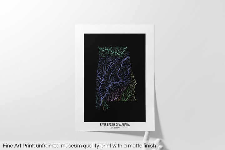 Unframed fine art print of a colourful map with a thick white mat. The title of the map and the Grasshopper Geography logo is printed on the mat, below the image. The map print lies flat on a white surface, a hand holding up one of the corners. The bottom text reads: Fine art print - unframed museum quality print with a matte finish.