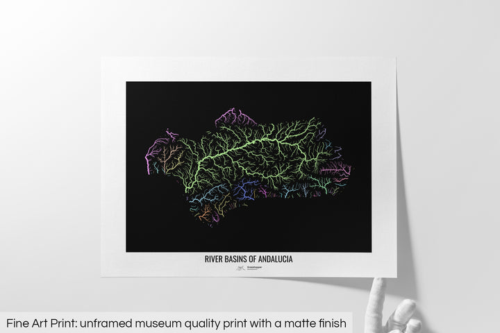 Unframed fine art print of a colourful map with a thick white mat. The title of the map and the Grasshopper Geography logo is printed on the mat, below the image. The map print lies flat on a white surface, a hand holding up one of the corners. The bottom text reads: Fine art print - unframed museum quality print with a matte finish.