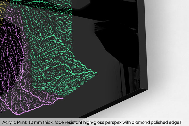 Closeup of an acrylic panel's corner, the details of a Grasshopper Geography map is visible. The text at the bottom reads: Acrylic print - 10 mm thick, fade reistant high-gloss perspex with diamond polished edges.