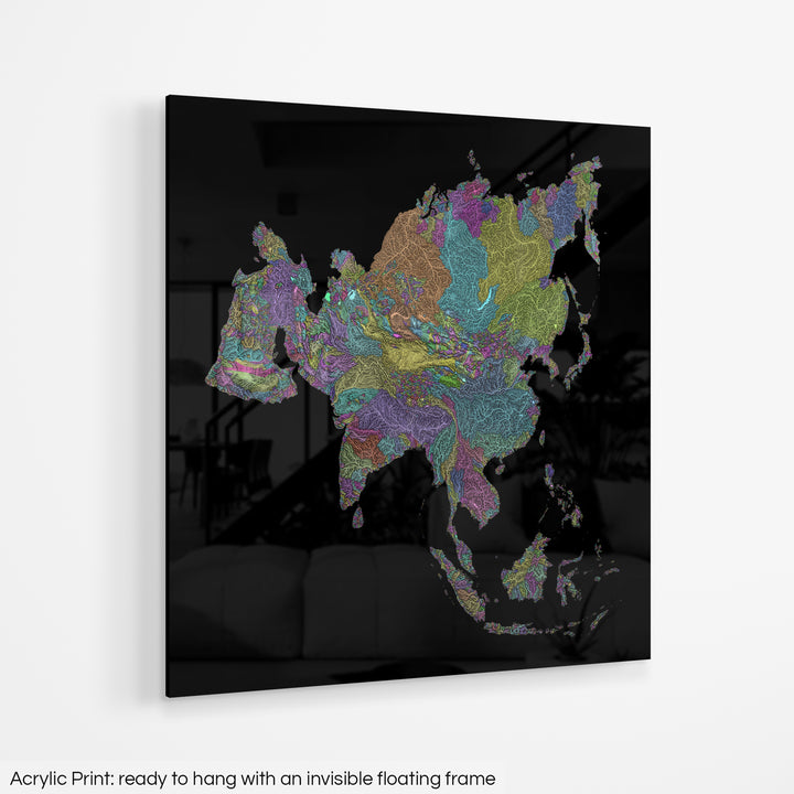 A colourful Grasshopper Geography map hanging on a white wall. The text at the bottom reads: Acrylic print - ready to hang with an invisible floating frame.