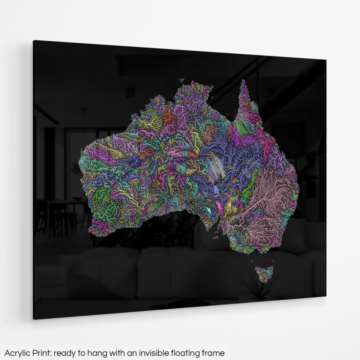 A colourful Grasshopper Geography map hanging on a white wall. The text at the bottom reads: Acrylic print - ready to hang with an invisible floating frame.
