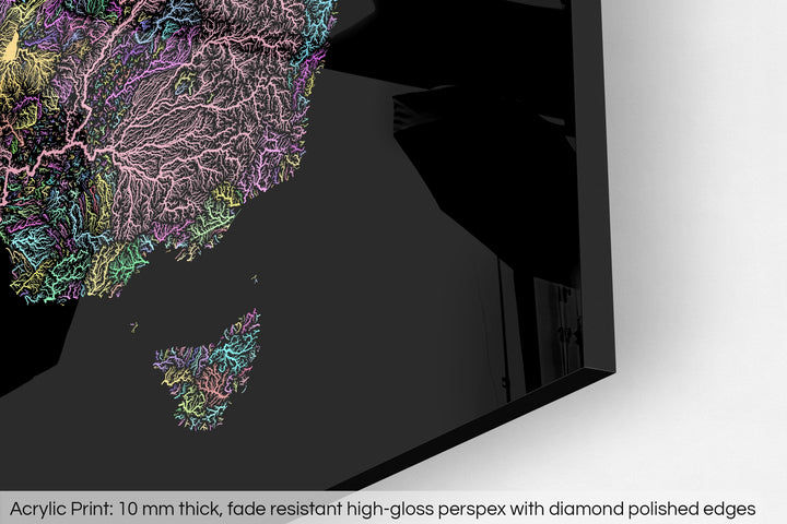 Closeup of an acrylic panel's corner, the details of a Grasshopper Geography map is visible. The text at the bottom reads: Acrylic print - 10 mm thick, fade reistant high-gloss perspex with diamond polished edges.
