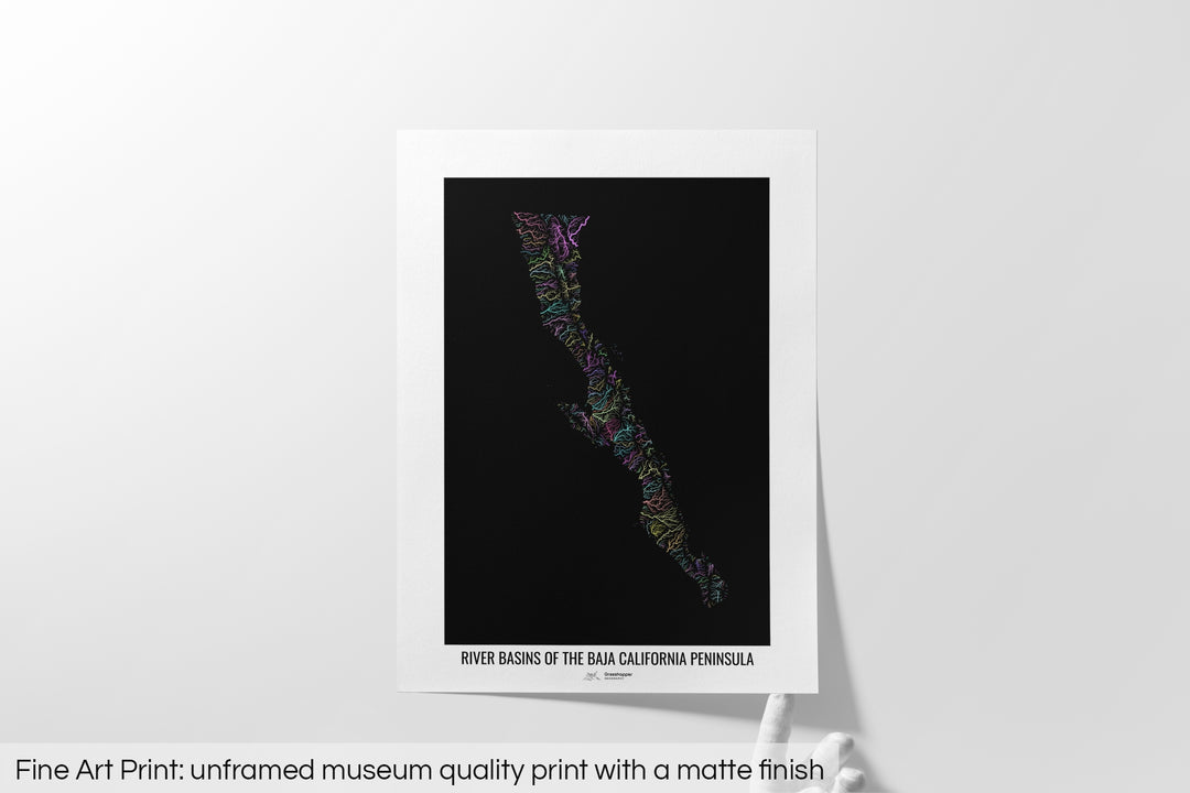 Unframed fine art print of a colourful map with a thick white mat. The title of the map and the Grasshopper Geography logo is printed on the mat, below the image. The map print lies flat on a white surface, a hand holding up one of the corners. The bottom text reads: Fine art print - unframed museum quality print with a matte finish.