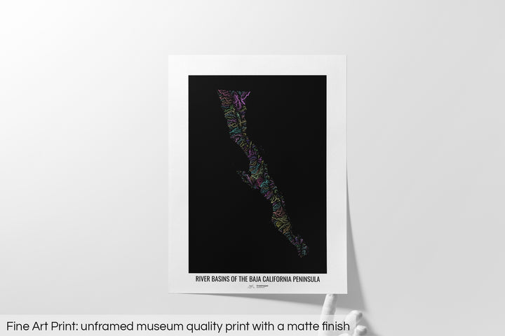 Unframed fine art print of a colourful map with a thick white mat. The title of the map and the Grasshopper Geography logo is printed on the mat, below the image. The map print lies flat on a white surface, a hand holding up one of the corners. The bottom text reads: Fine art print - unframed museum quality print with a matte finish.
