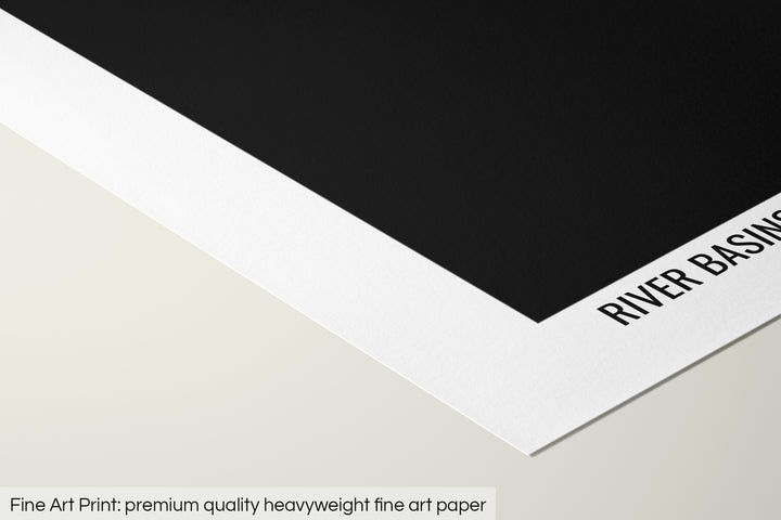 Closeup of a fine art print's corner lying on a flat surface, the details of a Grasshopper Geography map is visible. The text at the bottom reads: Fine art print - premium quality heavyweight fine art paper.