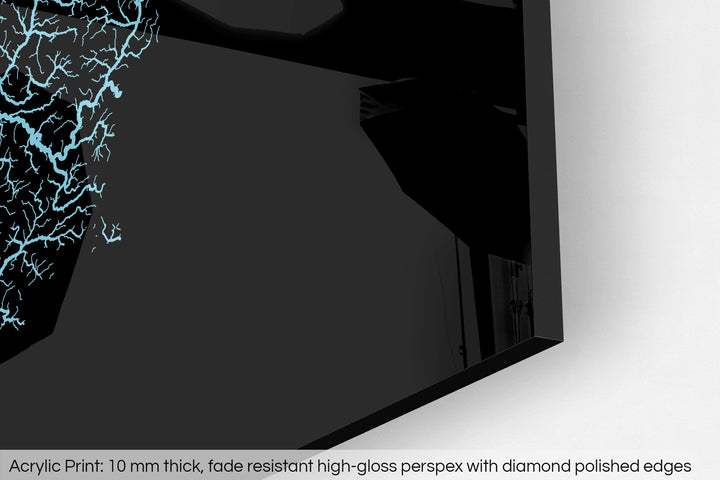 Closeup of an acrylic panel's corner, the details of a Grasshopper Geography map is visible. The text at the bottom reads: Acrylic print - 10 mm thick, fade reistant high-gloss perspex with diamond polished edges.