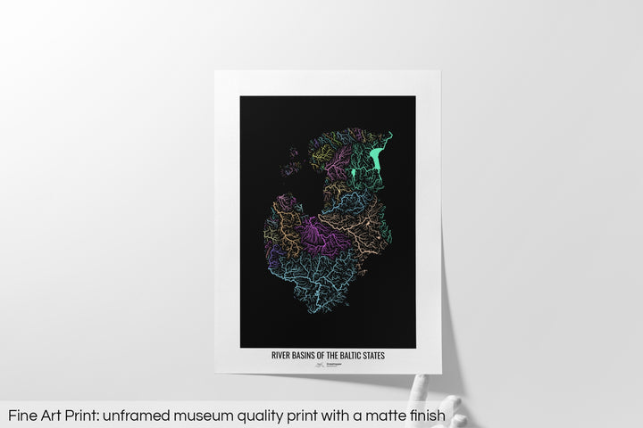 Unframed fine art print of a colourful map with a thick white mat. The title of the map and the Grasshopper Geography logo is printed on the mat, below the image. The map print lies flat on a white surface, a hand holding up one of the corners. The bottom text reads: Fine art print - unframed museum quality print with a matte finish.