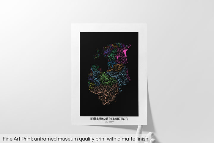 Unframed fine art print of a colourful map with a thick white mat. The title of the map and the Grasshopper Geography logo is printed on the mat, below the image. The map print lies flat on a white surface, a hand holding up one of the corners. The bottom text reads: Fine art print - unframed museum quality print with a matte finish.