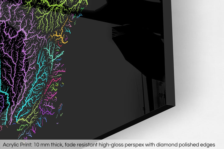 Closeup of an acrylic panel's corner, the details of a Grasshopper Geography map is visible. The text at the bottom reads: Acrylic print - 10 mm thick, fade reistant high-gloss perspex with diamond polished edges.