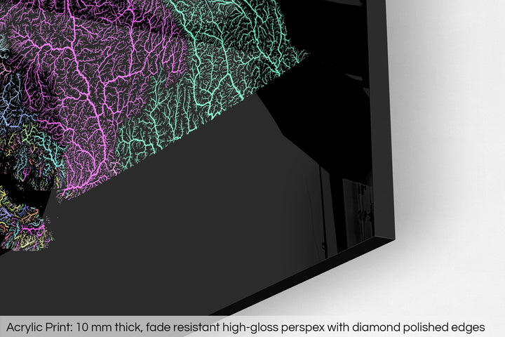 Closeup of an acrylic panel's corner, the details of a Grasshopper Geography map is visible. The text at the bottom reads: Acrylic print - 10 mm thick, fade reistant high-gloss perspex with diamond polished edges.