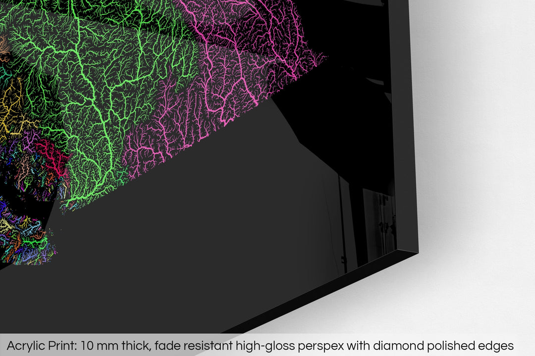 Closeup of an acrylic panel's corner, the details of a Grasshopper Geography map is visible. The text at the bottom reads: Acrylic print - 10 mm thick, fade reistant high-gloss perspex with diamond polished edges.