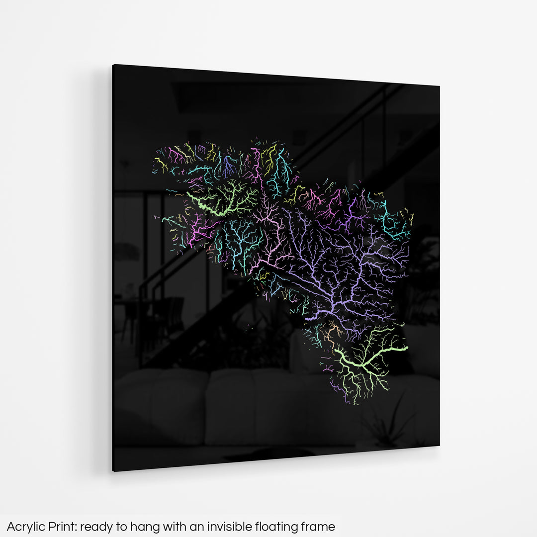 A colourful Grasshopper Geography map hanging on a white wall. The text at the bottom reads: Acrylic print - ready to hang with an invisible floating frame.
