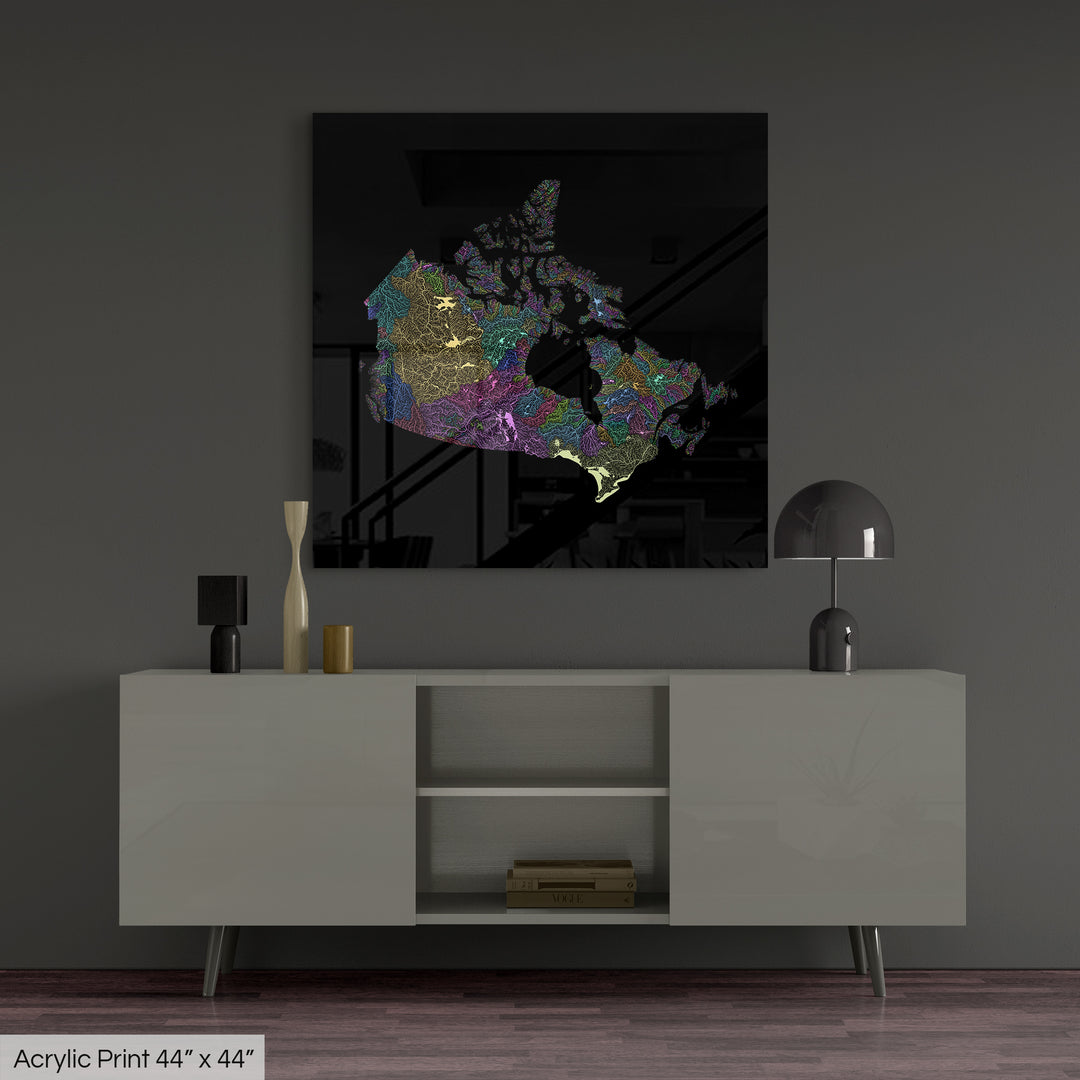 A colourful Grasshopper Geography map, home decor hanging on a grey wall in a living room. The map is printed on an acrylic panel and hangs above a modern low storage cabinet.