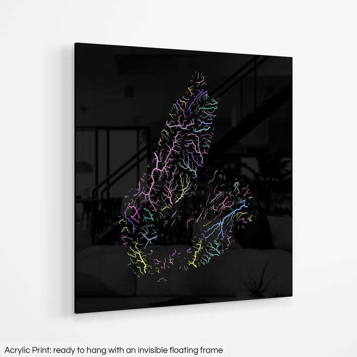 A colourful Grasshopper Geography map hanging on a white wall. The text at the bottom reads: Acrylic print - ready to hang with an invisible floating frame.