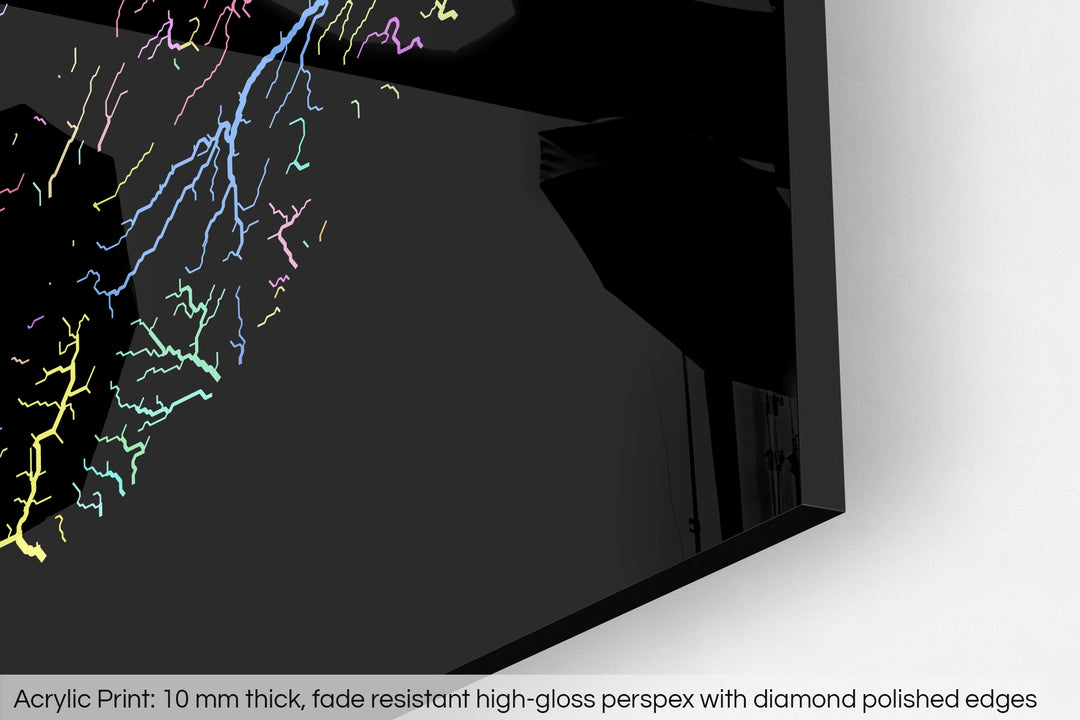 Closeup of an acrylic panel's corner, the details of a Grasshopper Geography map is visible. The text at the bottom reads: Acrylic print - 10 mm thick, fade reistant high-gloss perspex with diamond polished edges.