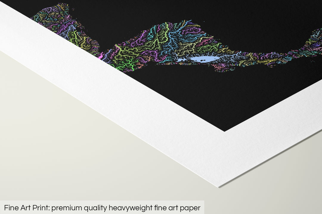 Closeup of a fine art print's corner lying on a flat surface, the details of a Grasshopper Geography map is visible. The text at the bottom reads: Fine art print - premium quality heavyweight fine art paper.