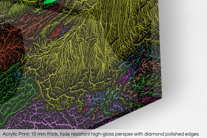 Closeup of an acrylic panel's corner, the details of a Grasshopper Geography map is visible. The text at the bottom reads: Acrylic print - 10 mm thick, fade reistant high-gloss perspex with diamond polished edges.