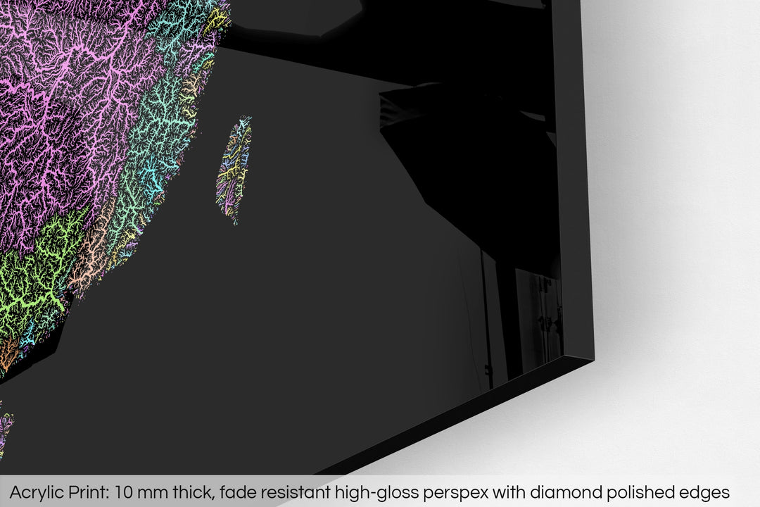 Closeup of an acrylic panel's corner, the details of a Grasshopper Geography map is visible. The text at the bottom reads: Acrylic print - 10 mm thick, fade reistant high-gloss perspex with diamond polished edges.