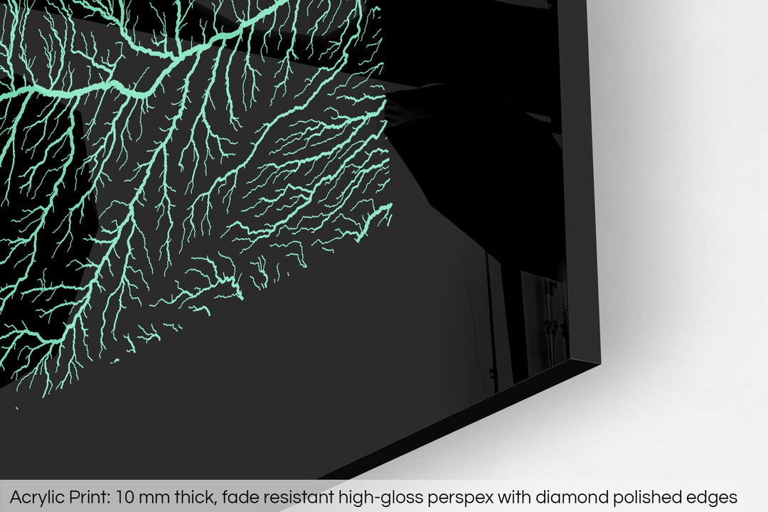 Closeup of an acrylic panel's corner, the details of a Grasshopper Geography map is visible. The text at the bottom reads: Acrylic print - 10 mm thick, fade reistant high-gloss perspex with diamond polished edges.