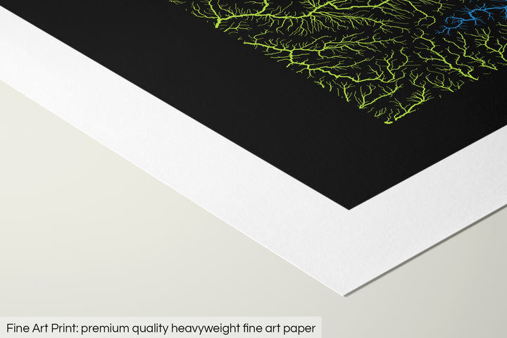 Closeup of a fine art print's corner lying on a flat surface, the details of a Grasshopper Geography map is visible. The text at the bottom reads: Fine art print - premium quality heavyweight fine art paper.