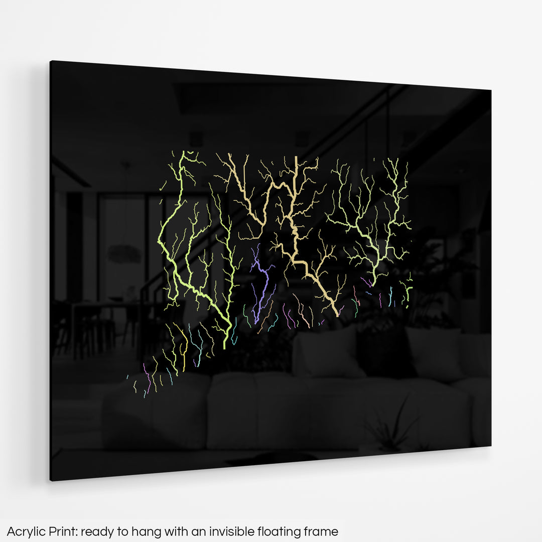 A colourful Grasshopper Geography map hanging on a white wall. The text at the bottom reads: Acrylic print - ready to hang with an invisible floating frame.