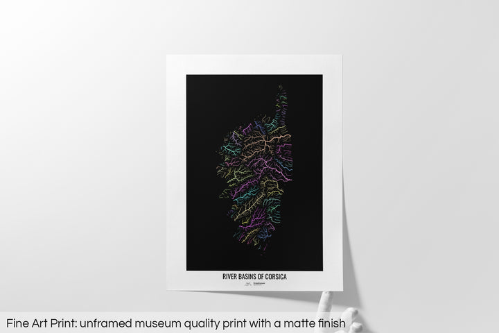 Unframed fine art print of a colourful map with a thick white mat. The title of the map and the Grasshopper Geography logo is printed on the mat, below the image. The map print lies flat on a white surface, a hand holding up one of the corners. The bottom text reads: Fine art print - unframed museum quality print with a matte finish.