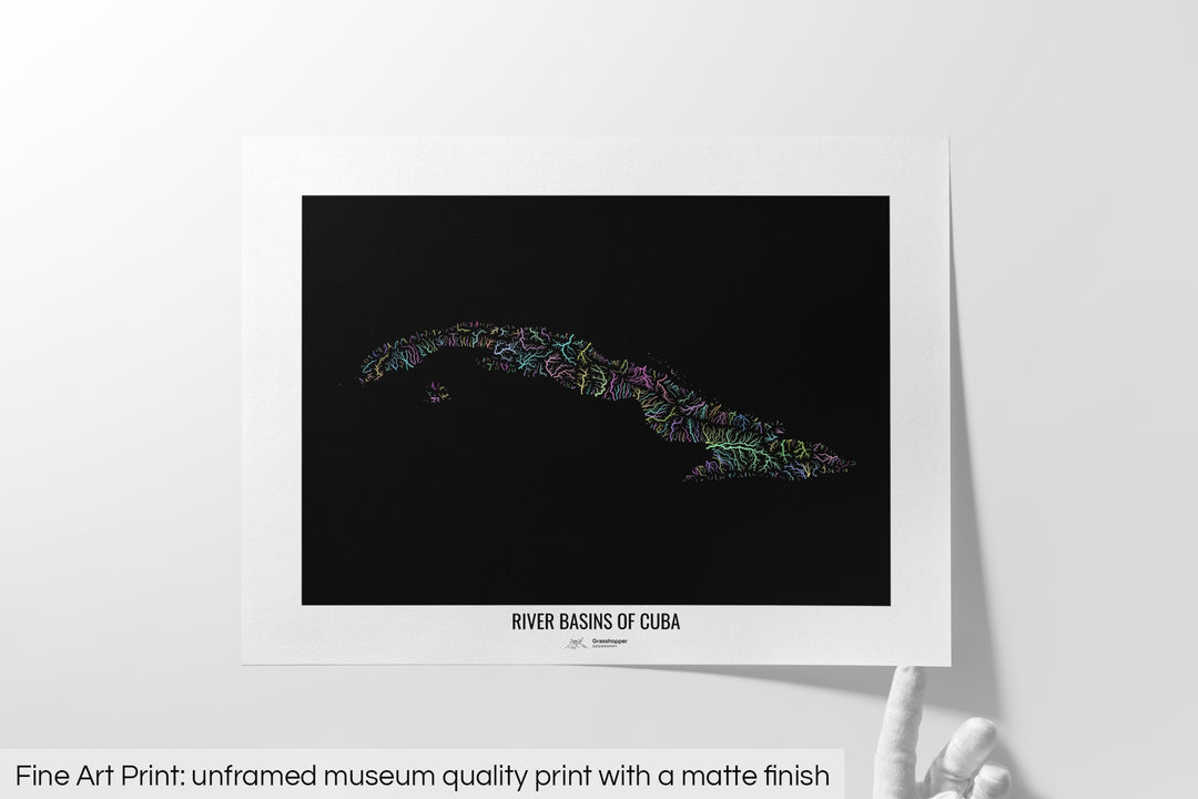 Unframed fine art print of a colourful map with a thick white mat. The title of the map and the Grasshopper Geography logo is printed on the mat, below the image. The map print lies flat on a white surface, a hand holding up one of the corners. The bottom text reads: Fine art print - unframed museum quality print with a matte finish.
