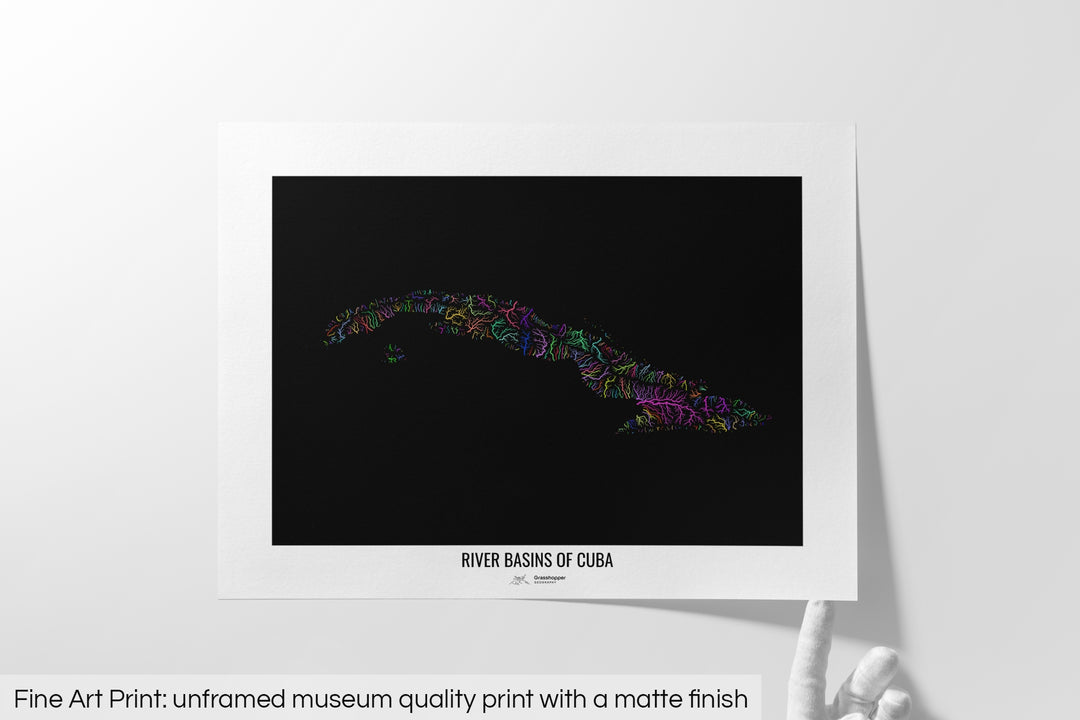 Unframed fine art print of a colourful map with a thick white mat. The title of the map and the Grasshopper Geography logo is printed on the mat, below the image. The map print lies flat on a white surface, a hand holding up one of the corners. The bottom text reads: Fine art print - unframed museum quality print with a matte finish.