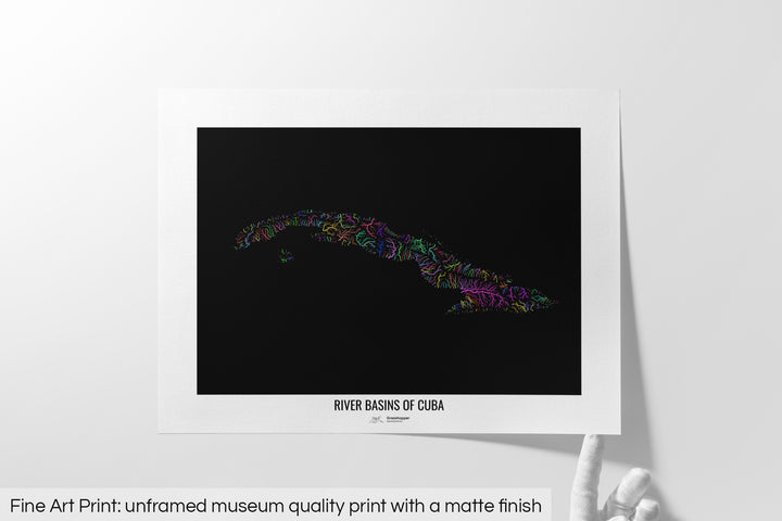 Unframed fine art print of a colourful map with a thick white mat. The title of the map and the Grasshopper Geography logo is printed on the mat, below the image. The map print lies flat on a white surface, a hand holding up one of the corners. The bottom text reads: Fine art print - unframed museum quality print with a matte finish.