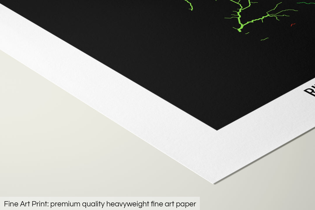 Closeup of a fine art print's corner lying on a flat surface, the details of a Grasshopper Geography map is visible. The text at the bottom reads: Fine art print - premium quality heavyweight fine art paper.