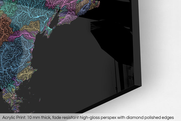 Closeup of an acrylic panel's corner, the details of a Grasshopper Geography map is visible. The text at the bottom reads: Acrylic print - 10 mm thick, fade reistant high-gloss perspex with diamond polished edges.