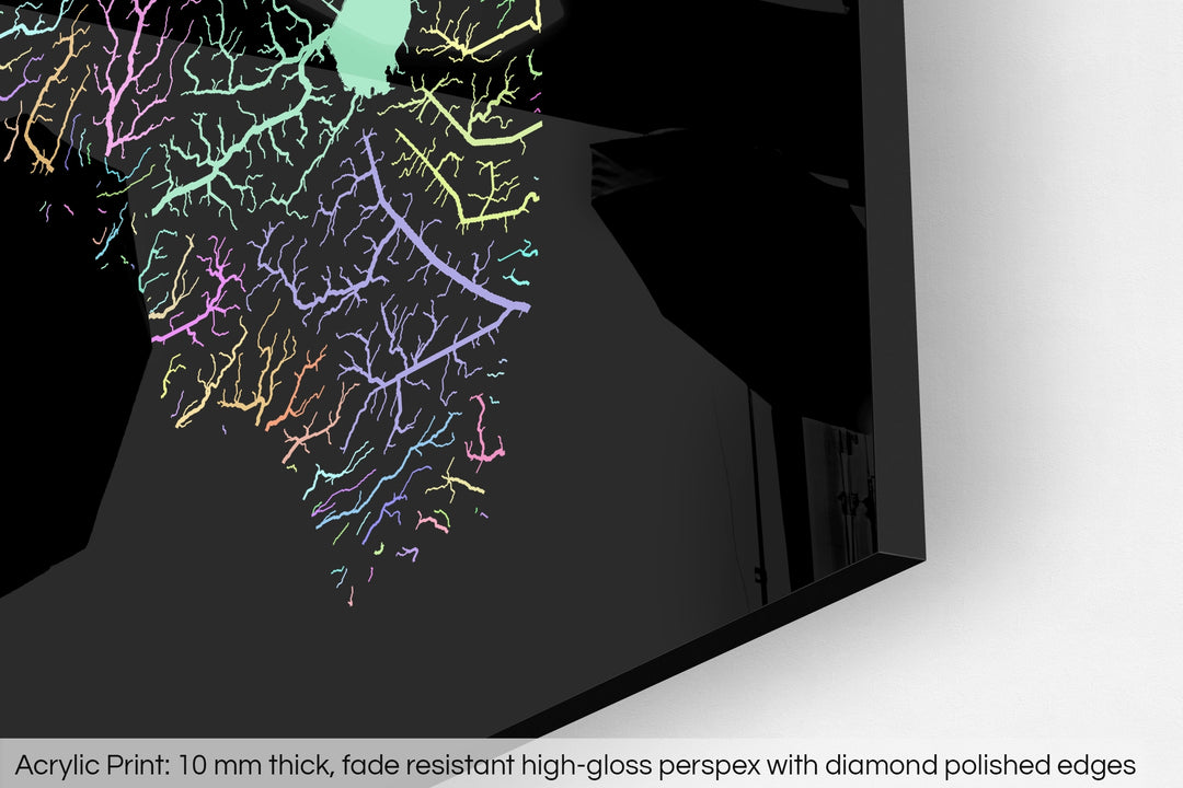 Closeup of an acrylic panel's corner, the details of a Grasshopper Geography map is visible. The text at the bottom reads: Acrylic print - 10 mm thick, fade reistant high-gloss perspex with diamond polished edges.