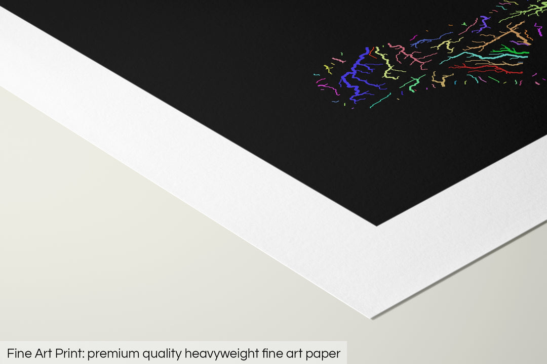Closeup of a fine art print's corner lying on a flat surface, the details of a Grasshopper Geography map is visible. The text at the bottom reads: Fine art print - premium quality heavyweight fine art paper.