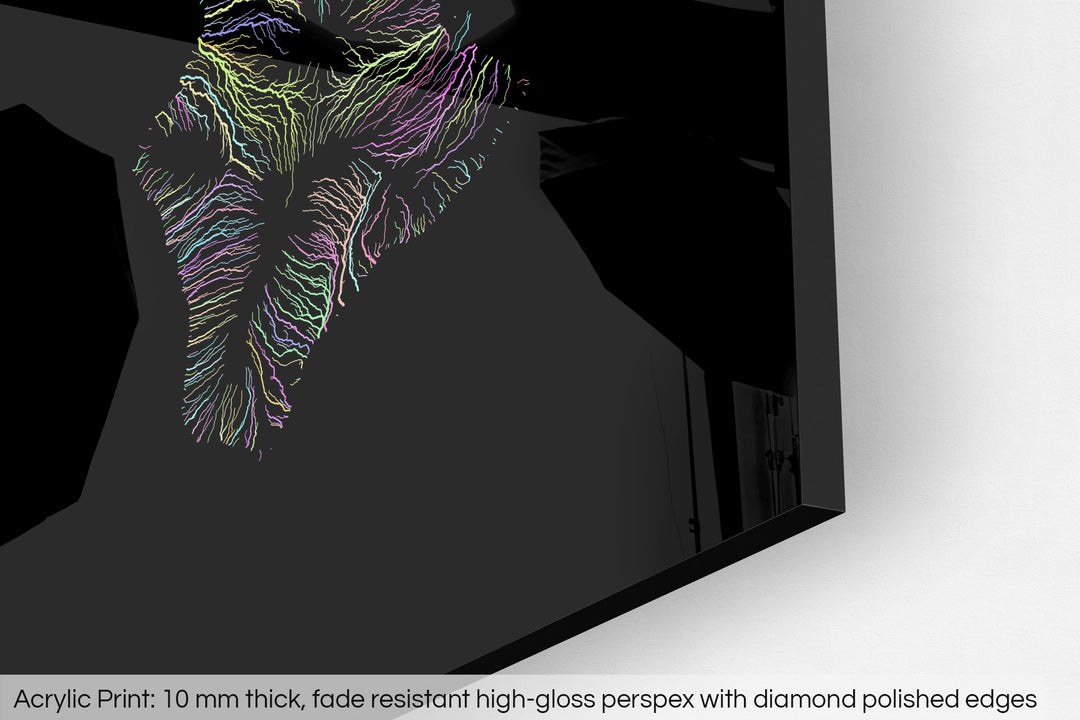 Closeup of an acrylic panel's corner, the details of a Grasshopper Geography map is visible. The text at the bottom reads: Acrylic print - 10 mm thick, fade reistant high-gloss perspex with diamond polished edges.