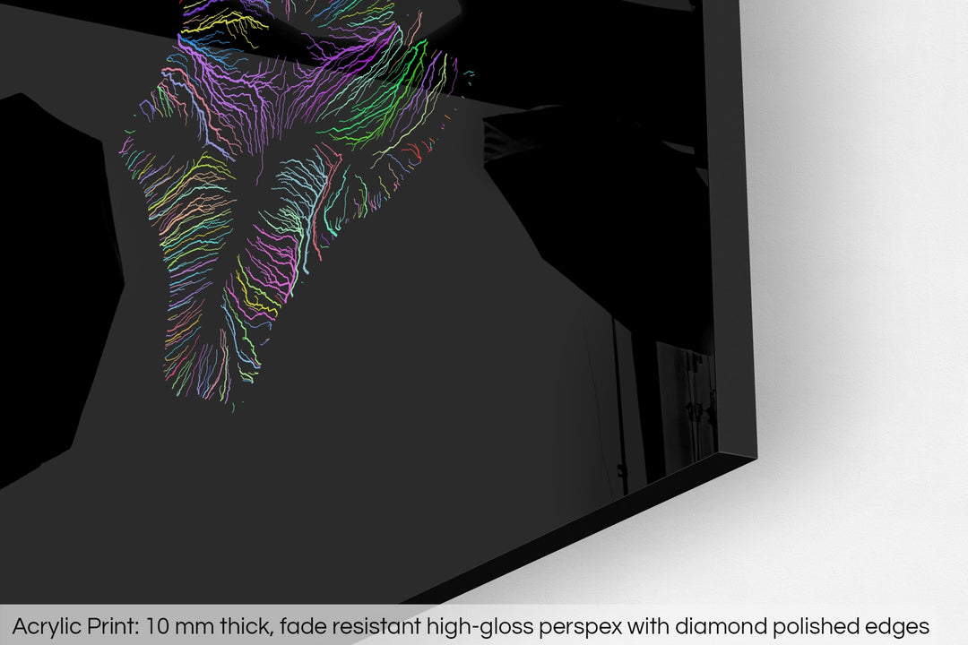 Closeup of an acrylic panel's corner, the details of a Grasshopper Geography map is visible. The text at the bottom reads: Acrylic print - 10 mm thick, fade reistant high-gloss perspex with diamond polished edges.