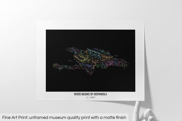 Unframed fine art print of a colourful map with a thick white mat. The title of the map and the Grasshopper Geography logo is printed on the mat, below the image. The map print lies flat on a white surface, a hand holding up one of the corners. The bottom text reads: Fine art print - unframed museum quality print with a matte finish.