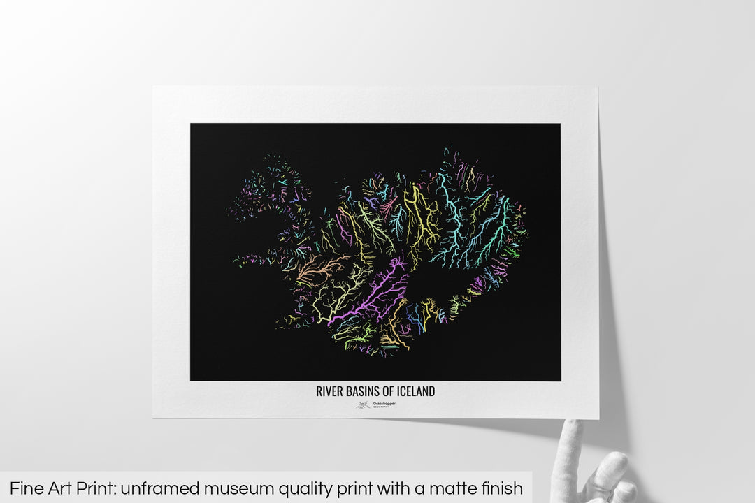 Unframed fine art print of a colourful map with a thick white mat. The title of the map and the Grasshopper Geography logo is printed on the mat, below the image. The map print lies flat on a white surface, a hand holding up one of the corners. The bottom text reads: Fine art print - unframed museum quality print with a matte finish.