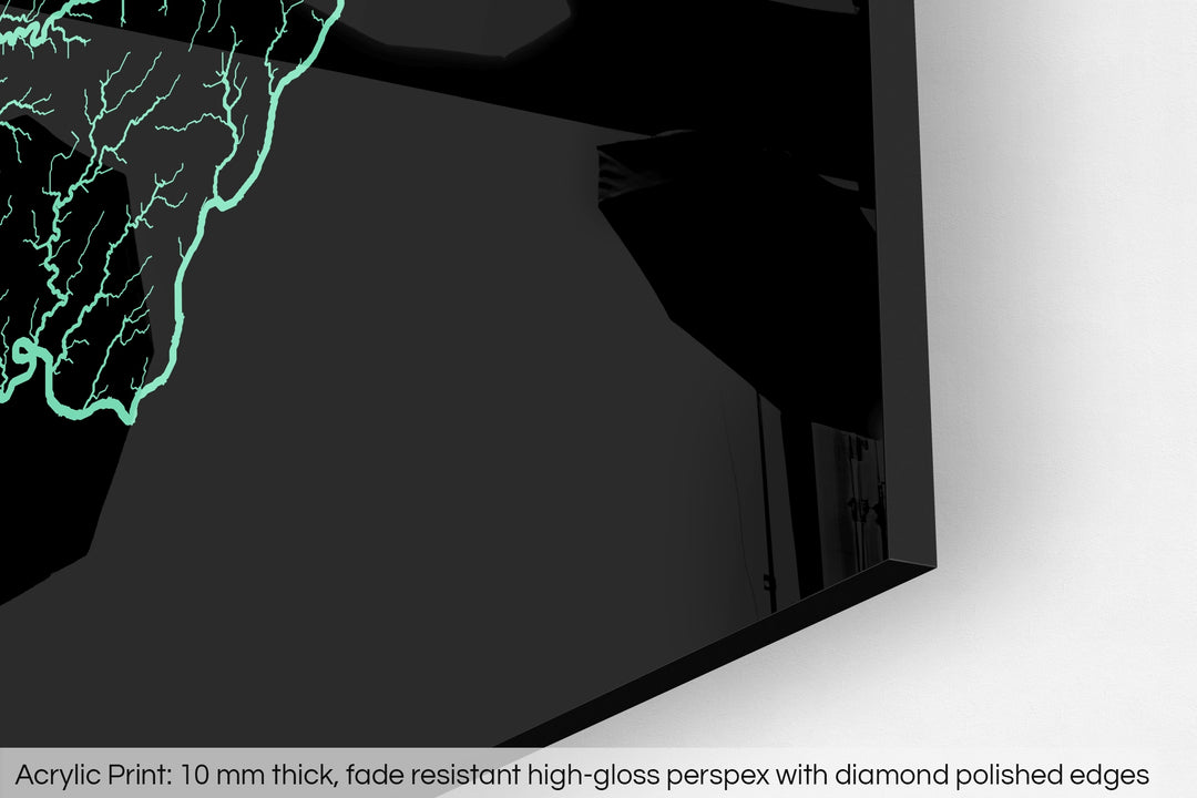 Closeup of an acrylic panel's corner, the details of a Grasshopper Geography map is visible. The text at the bottom reads: Acrylic print - 10 mm thick, fade reistant high-gloss perspex with diamond polished edges.
