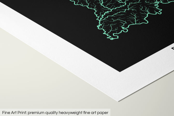 Closeup of a fine art print's corner lying on a flat surface, the details of a Grasshopper Geography map is visible. The text at the bottom reads: Fine art print - premium quality heavyweight fine art paper.