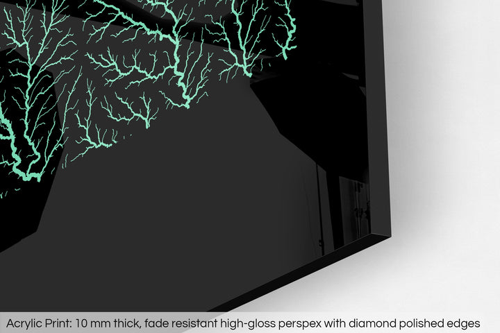 Closeup of an acrylic panel's corner, the details of a Grasshopper Geography map is visible. The text at the bottom reads: Acrylic print - 10 mm thick, fade reistant high-gloss perspex with diamond polished edges.