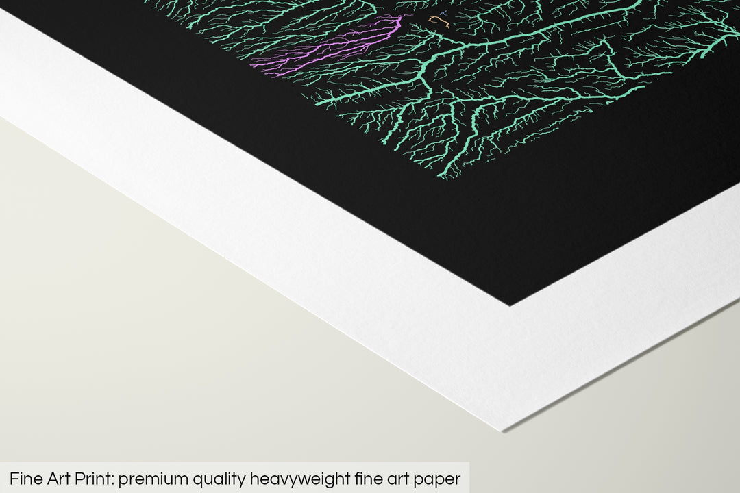Closeup of a fine art print's corner lying on a flat surface, the details of a Grasshopper Geography map is visible. The text at the bottom reads: Fine art print - premium quality heavyweight fine art paper.
