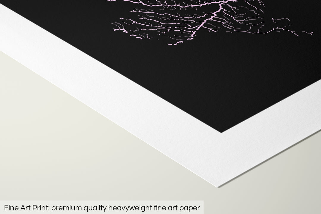 Closeup of a fine art print's corner lying on a flat surface, the details of a Grasshopper Geography map is visible. The text at the bottom reads: Fine art print - premium quality heavyweight fine art paper.