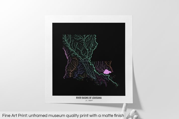 Unframed fine art print of a colourful map with a thick white mat. The title of the map and the Grasshopper Geography logo is printed on the mat, below the image. The map print lies flat on a white surface, a hand holding up one of the corners. The bottom text reads: Fine art print - unframed museum quality print with a matte finish.