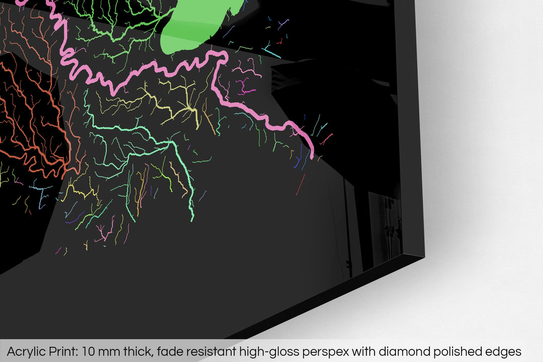 Closeup of an acrylic panel's corner, the details of a Grasshopper Geography map is visible. The text at the bottom reads: Acrylic print - 10 mm thick, fade reistant high-gloss perspex with diamond polished edges.