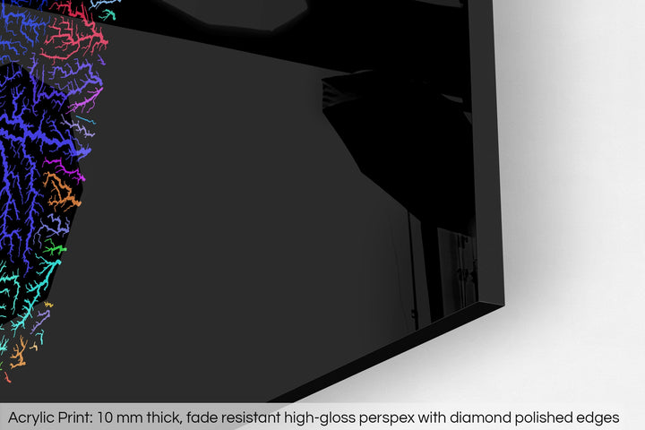 Closeup of an acrylic panel's corner, the details of a Grasshopper Geography map is visible. The text at the bottom reads: Acrylic print - 10 mm thick, fade reistant high-gloss perspex with diamond polished edges.