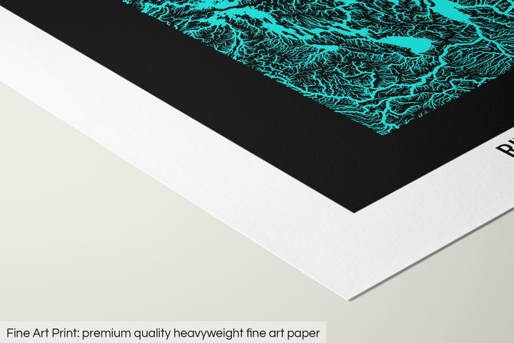 Closeup of a fine art print's corner lying on a flat surface, the details of a Grasshopper Geography map is visible. The text at the bottom reads: Fine art print - premium quality heavyweight fine art paper.
