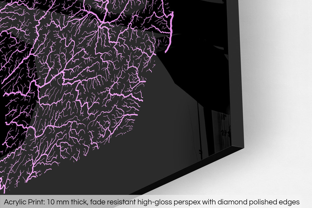 Closeup of an acrylic panel's corner, the details of a Grasshopper Geography map is visible. The text at the bottom reads: Acrylic print - 10 mm thick, fade reistant high-gloss perspex with diamond polished edges.