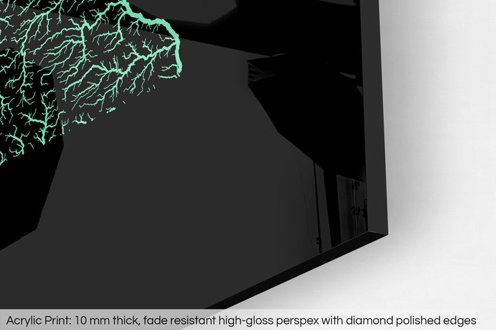 Closeup of an acrylic panel's corner, the details of a Grasshopper Geography map is visible. The text at the bottom reads: Acrylic print - 10 mm thick, fade reistant high-gloss perspex with diamond polished edges.
