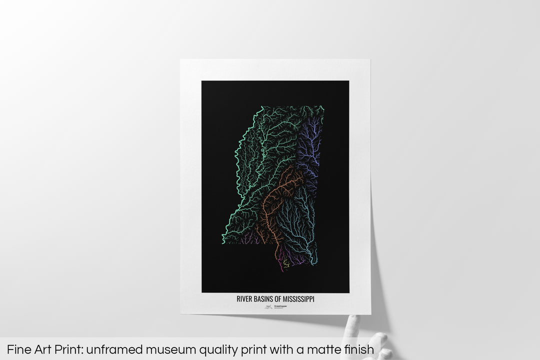 Unframed fine art print of a colourful map with a thick white mat. The title of the map and the Grasshopper Geography logo is printed on the mat, below the image. The map print lies flat on a white surface, a hand holding up one of the corners. The bottom text reads: Fine art print - unframed museum quality print with a matte finish.
